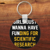 科学の研究のために資金を得たいと思う女の子 キーホルダー (正面)