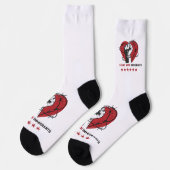 移民と共に立つ ソックス (左)