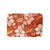 種や珊瑚色、赤などの丸いネベの形 バスマット (正面)