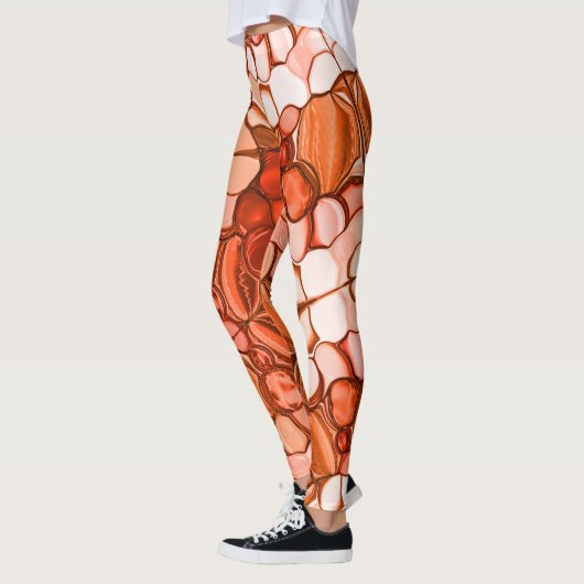 種や珊瑚色、赤などの丸いネベの形 レギンス (左)