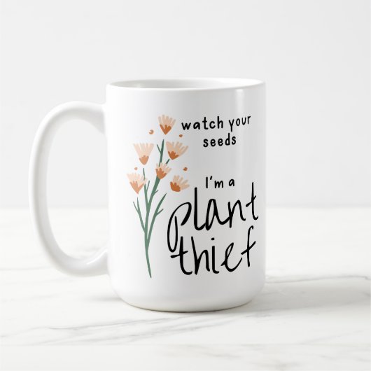 種を見ろ、私は植物泥棒 コーヒーマグカップ (左)