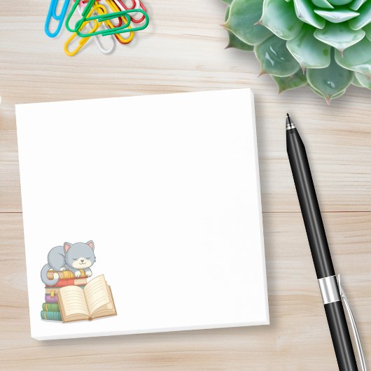 積まれた本の上のかわいい猫 ポストイット
