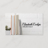 積み重ねられた本を持つ机 名刺 (正面)