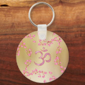 穏やかなパステルピンクの花の木とOMシンボル キーホルダー (正面)