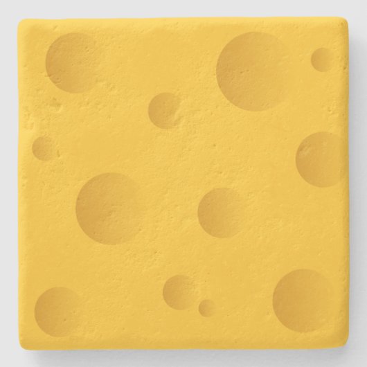 穴のあいた石灰岩コースターを持つ黄色のスイス産チーズ ストーンコースター (正面)