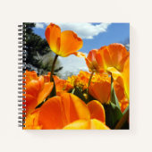 空に届くオレンジ色のチューリップ ノートブック (正面)