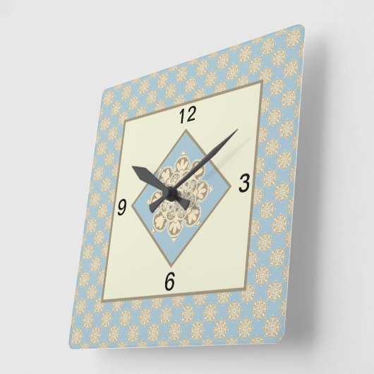 空の青い背景にクリーム色のメダリオンが飾られたスクエアキッチンクロック スクエア壁時計 (傾斜)