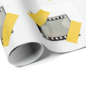 空の35mmフィルムフレーム、黄色のストリップ。 ラッピングペーパー (ロールコーナー)