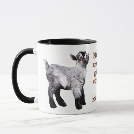 空気の鼻を持つベビーのヤギ マグカップ (左)