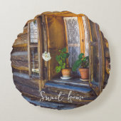 窓にゼラニウムの花が咲いている ラウンドクッション (正面)