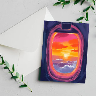 窓辺の席で見る夕陽の飛行機旅行のペイントカード