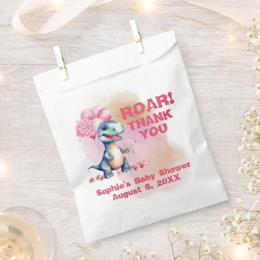 笑う女の子Tレックスベビーピンク フェイバーバッグ (クリップ留めされた状態)