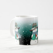 笑顔の雪だるま、吹雪の中の（鳥）ショウジョウコウカンチョウ コーヒーマグカップ (正面左)