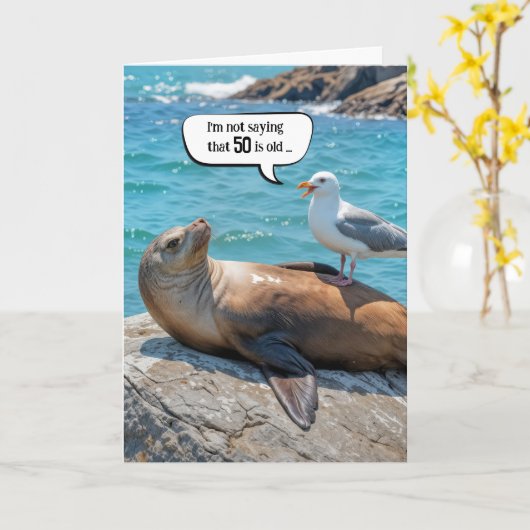 第50誕生日ユーモア・カモメが海獅子に浮かぶ カード (黄色い花)