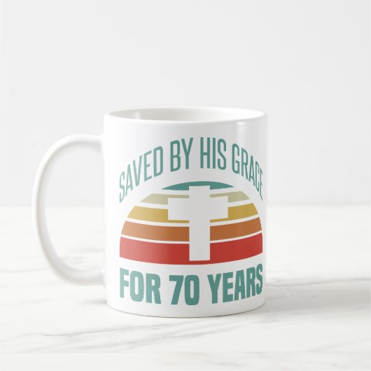 第70誕生日へのキリストへの贈り物 コーヒーマグカップ (左)