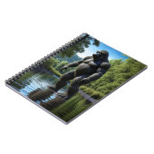 筋肉の片足の水中への反射 ノートブック (左側)