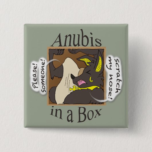 箱(閉鎖した目)のAnubis 缶バッジ (正面)