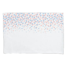 粉砕されたドットセレニティブルーとバラピンク枕