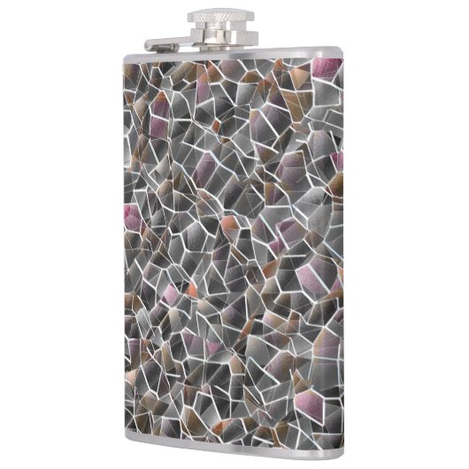 粗いサーモンと灰色の不規則なモザイクの散らかった フラスク (左)
