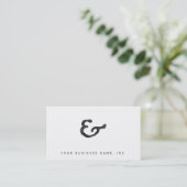 素朴で黒い凸版印刷のアンパーサンド 名刺 (スタンド正面)