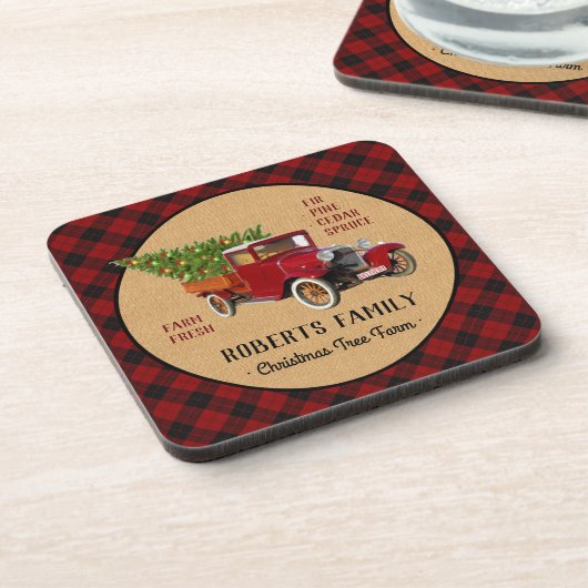 素朴なクリスマスツリーの農場のヴィンテージのトラックの赤い格子縞 コースター (左側)