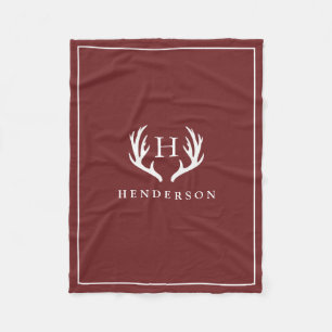 素朴なシカの(雄ジカの)枝角のモノグラムのクランベリーの赤 フリースブランケット