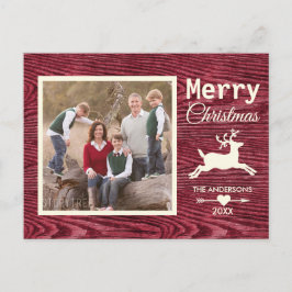 素朴な木製の赤いトナカイのクリスマスの家族写真 シーズンポストカード