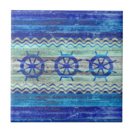 素朴な濃紺の沿岸装飾の船の車輪 タイル