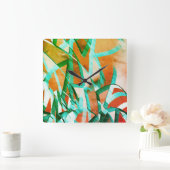 素朴な赤みがかったオストライプレンジの上の青またはシアンの色 スクエア壁時計 (ホーム)