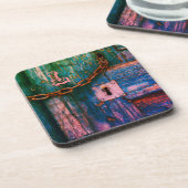 素朴色彩の鮮やか木鍵穴チェーン コースター (左側)