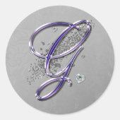 紫と銀のグリッタースファンシークリプトモノグラムG ラウンドシール (正面)