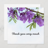 紫のジャカランダの花が木に咲いている (正面/裏面)