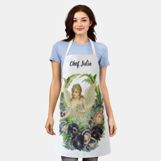 紫のビクトリアンパンジーの花とイースターエンジェル エプロン (着用した状態)