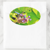 紫のピンクの花に虹色のトンボ 楕円形シール (バッグ)