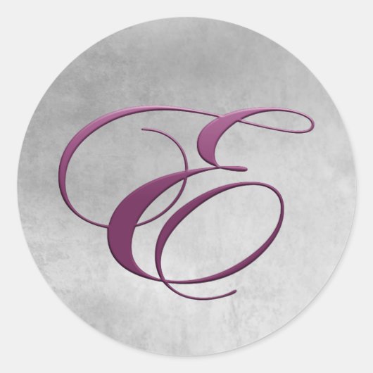 紫の文字E モノグラムの ラウンドシール (正面)