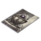 紫の華美クリスタルボールを持つ銀色の釜 ノートブック (左側)