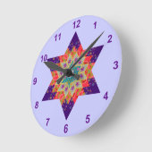 紫色およびオレンジの星のキルト ラウンド壁時計 (傾斜)