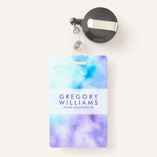 紫色および青の液体はBagroundを着色します バッジ (裏面リトラクタブル付き)