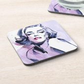 紫色でかわいらしい コースター (左側)