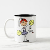 紫色の棒の姿のチアリーダーのTシャツおよびギフト ツートーンマグカップ (左)