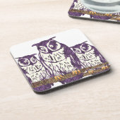 紫色の様式化されたジオメトリックフクロウファミリ コースター (左側)