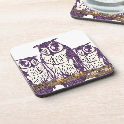 紫色の様式化されたジオメトリックフクロウファミリ コースター (左側)
