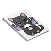 紫色の羽を持つ黒猫がドクロを抱っこ ノートブック (右側)