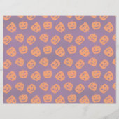 紫色の背景パターン上のハロウィーンカボチャ (正面)