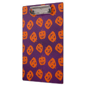 紫色の背景パターン上のハロウィーンカボチャ クリップボード (左)