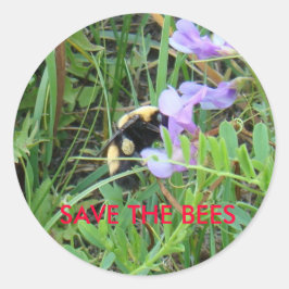 紫色の野草の上にF2ビー ラウンドシール