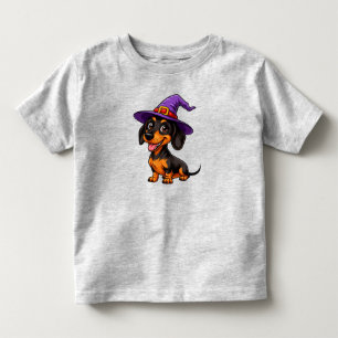 紫色の魔法使い帽子をかぶった愛らしい犬 トドラーTシャツ
