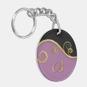 紫色の黒い渦巻きイニシャル キーホルダー (正面左)
