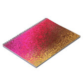 紫、ピンク、ブラウン、および金ゴールドスパイラルバインダーの色合い ノートブック (左側)