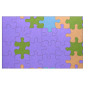 紫、緑、オレンジ、青のパズル パターン(の模様が)ある ファブリック (ファットクウォーター)